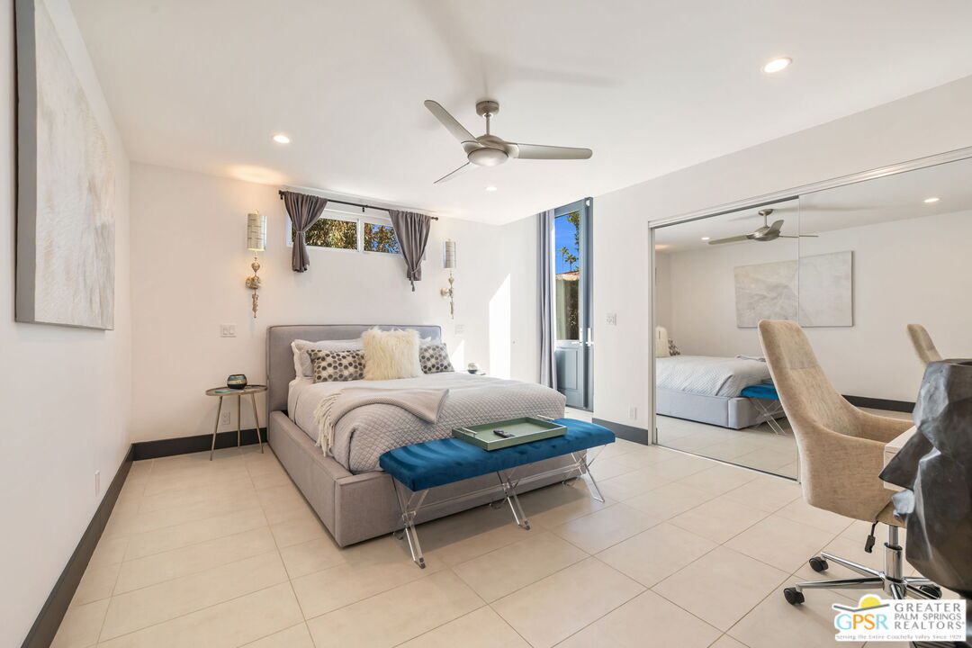 48365 Alan Circle Palm Desert, CA 92260 - Photo 58 of 75 a bed room with a bed and a chair