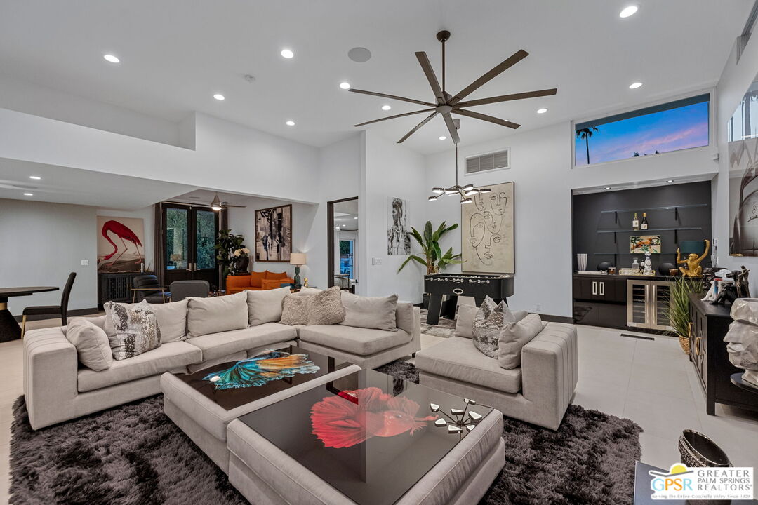 48365 Alan Circle Palm Desert, CA 92260 - Photo 7 of 75 a living room with furniture ceiling fan and a rug