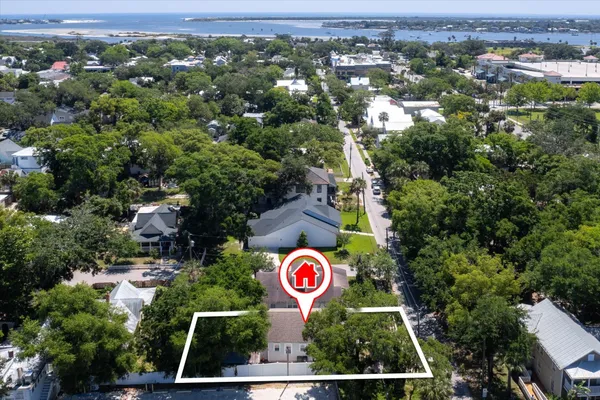 an aerial view of residential house with parking space