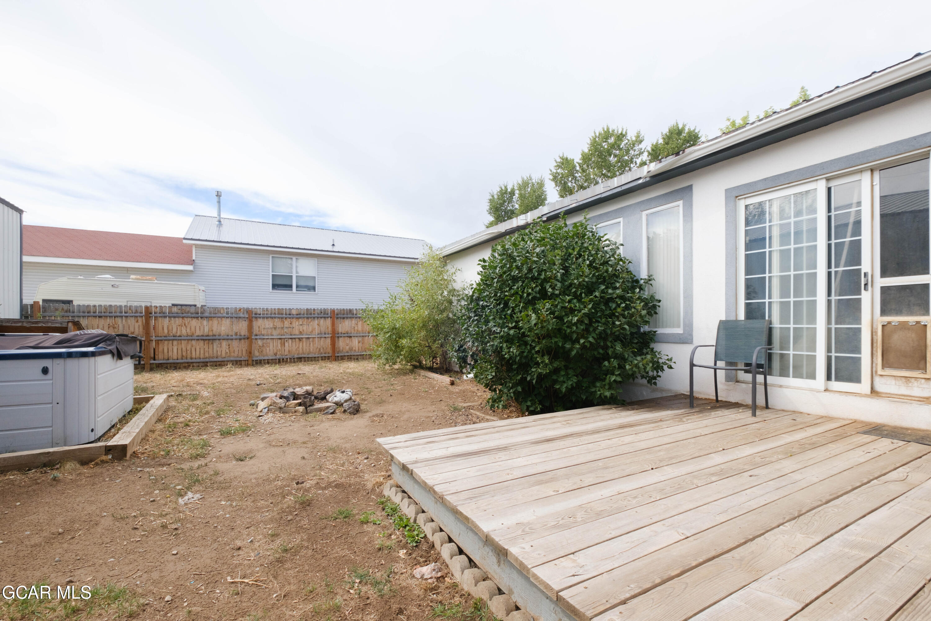 404 5th Street Kremmling, CO 80459 - Photo 32 of 55 back patio and hot tub area