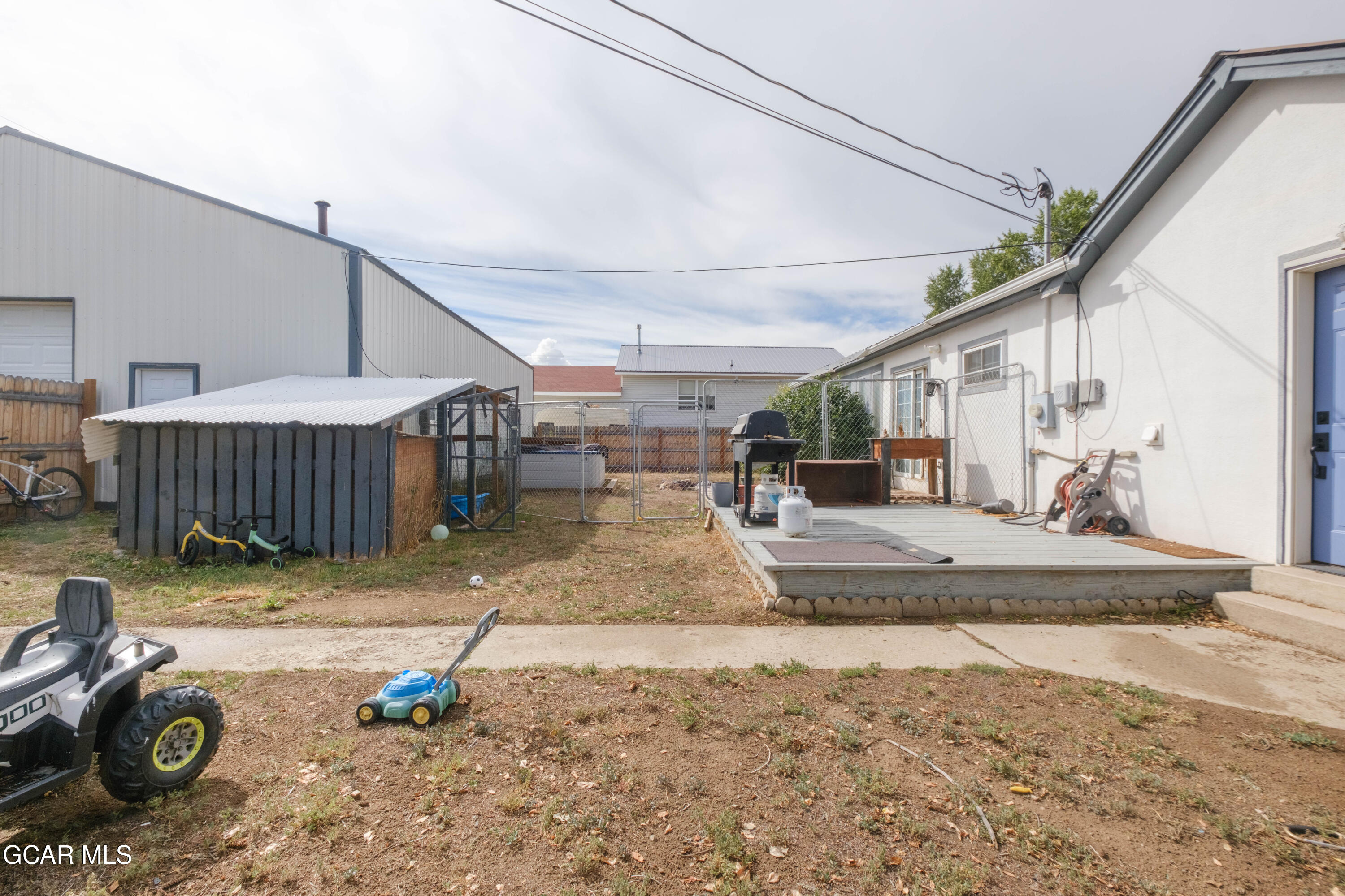 404 5th Street Kremmling, CO 80459 - Photo 34 of 56 fenced in yard back patio view