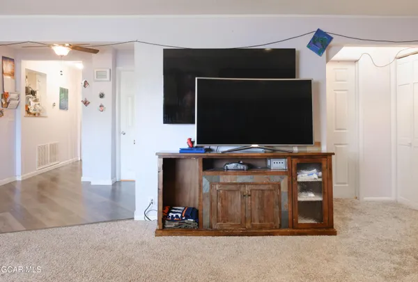 a view of a dining room with furniture