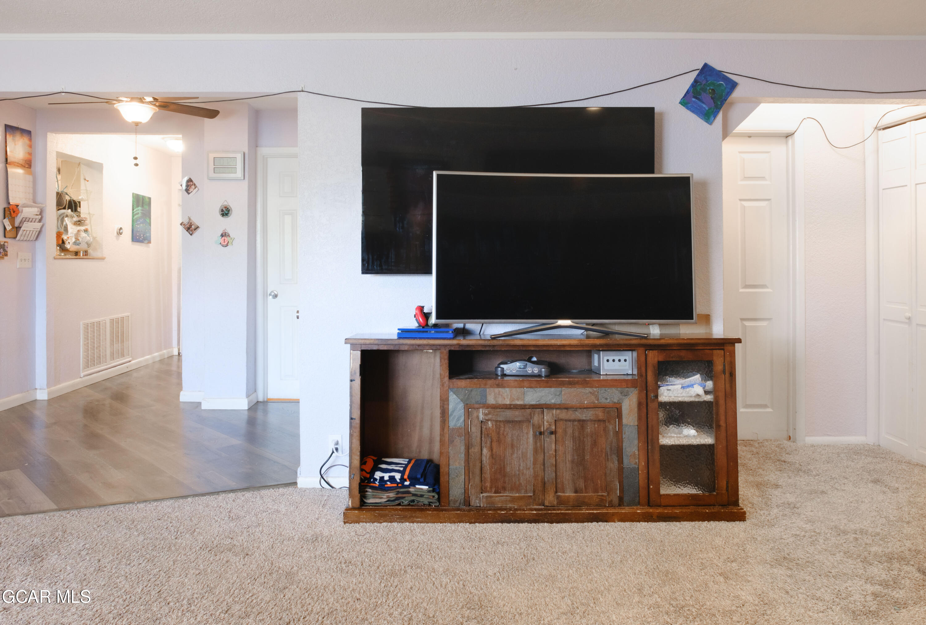 404 5th Street Kremmling, CO 80459 - Photo 5 of 56 a living room with furniture and a flat screen tv