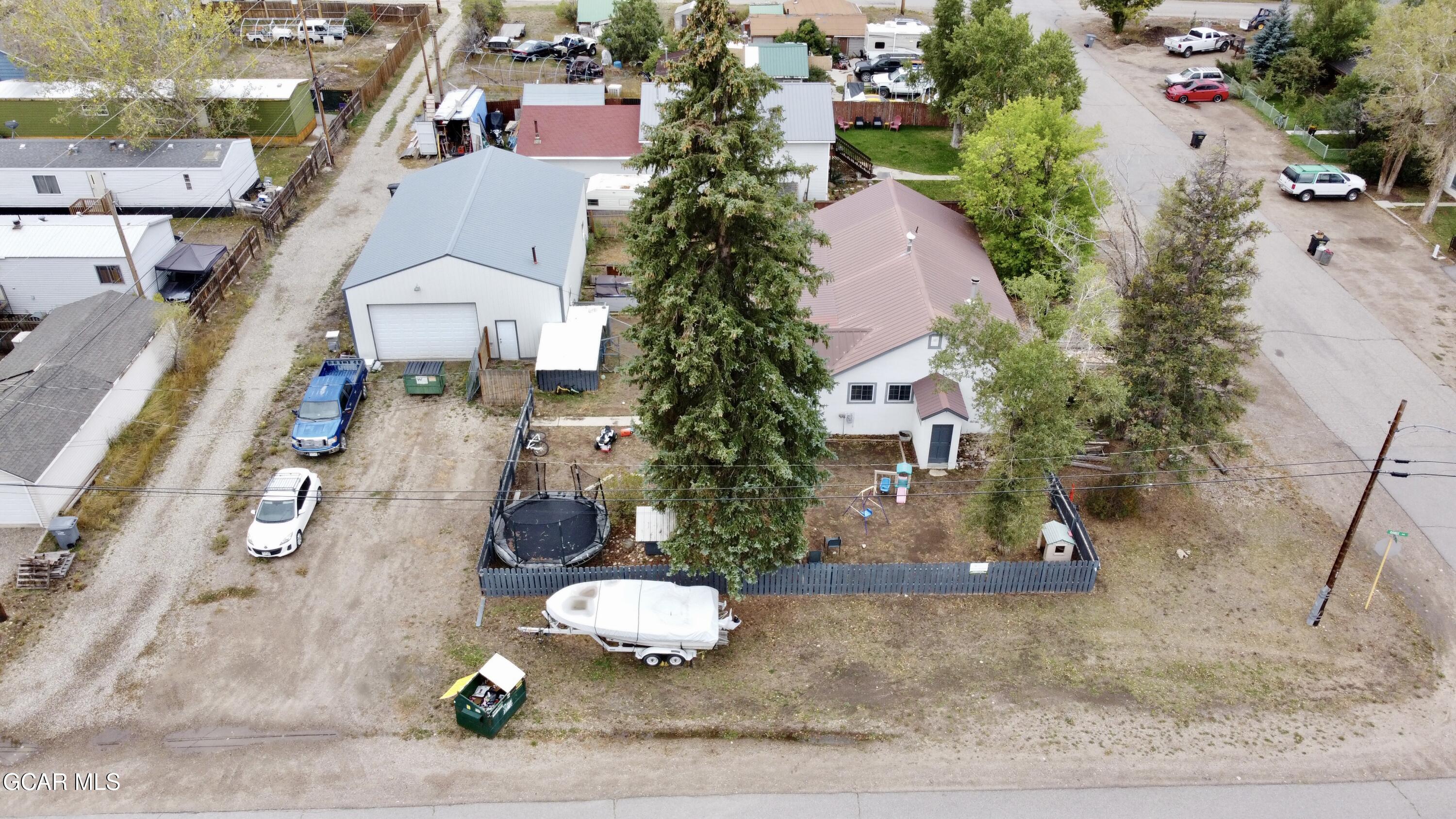 404 5th Street Kremmling, CO 80459 - Photo 51 of 56 an aerial view of a house with a yard