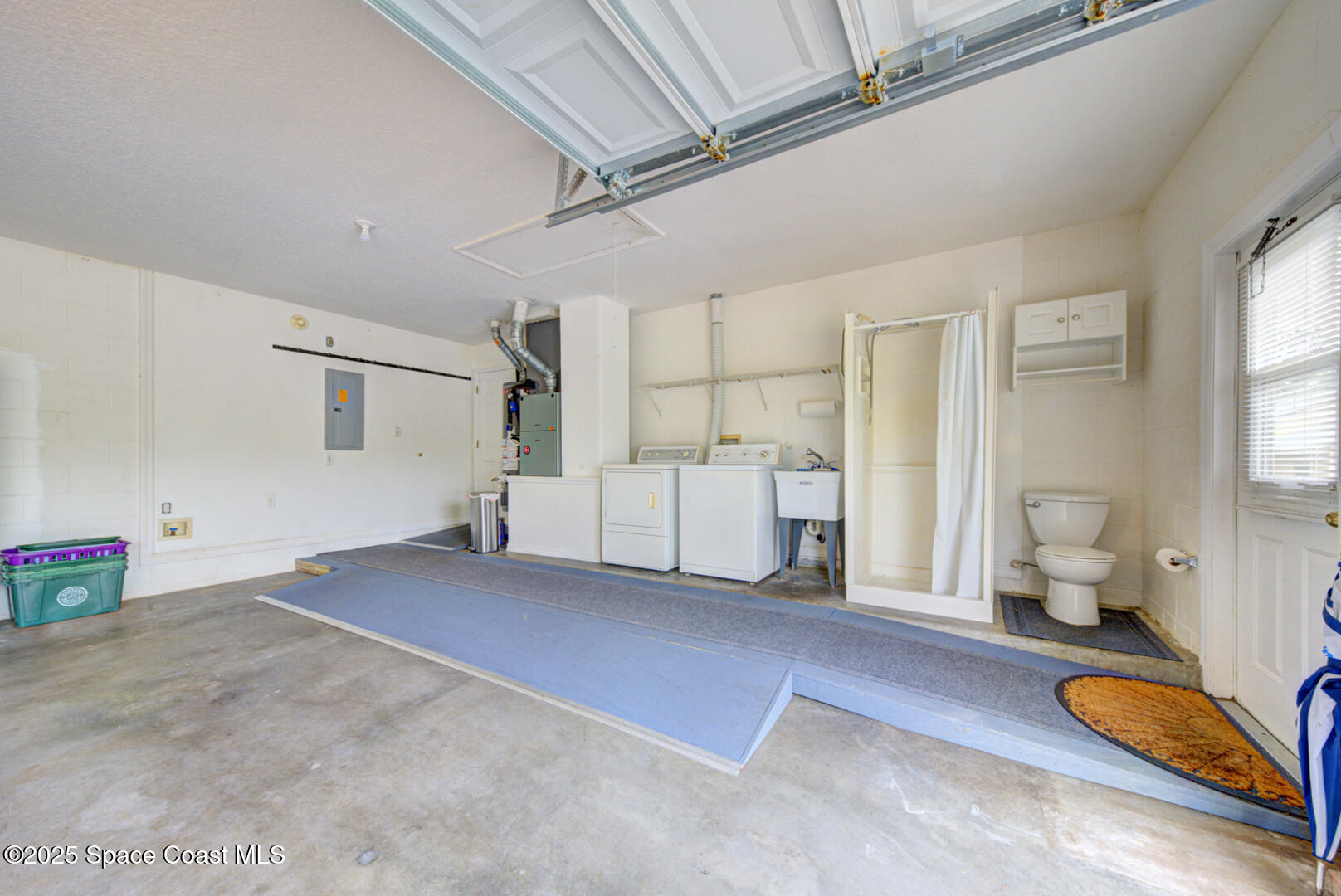 3105 Diamond Road Titusville, FL 32796 - Photo 51 of 81 garage with bathroom
