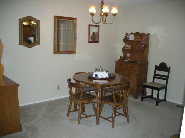 3083 Messinger Drive Marina, CA 93933 - Photo 11 of 18 a view of a dining room with furniture and wooden floor