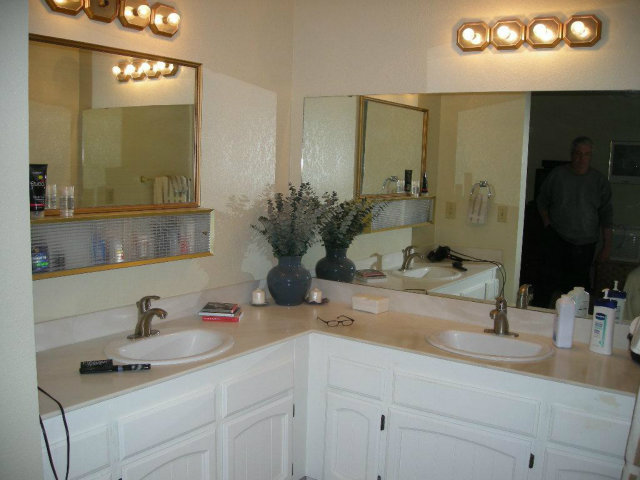 3083 Messinger Drive Marina, CA 93933 - Photo 16 of 18 a bathroom with a sink and a mirror