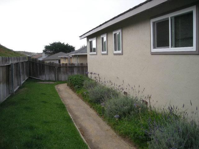 3083 Messinger Drive Marina, CA 93933 - Photo 5 of 18 a backyard of a house with lots of green space