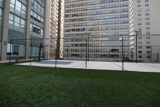 655 West Irving Park Road, Unit 2911 Chicago, IL 60613 - Photo 12 of 42 a view of a city with tall buildings