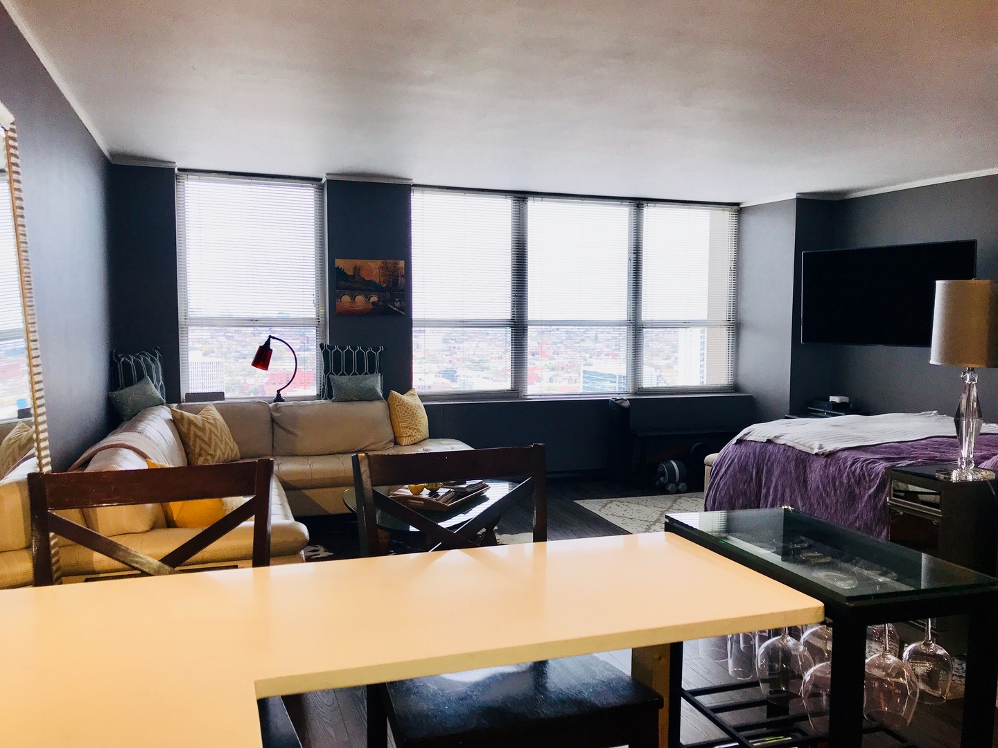 655 West Irving Park Road, Unit 2911 Chicago, IL 60613 - Photo 22 of 42 a living room with furniture a flat screen tv and a window