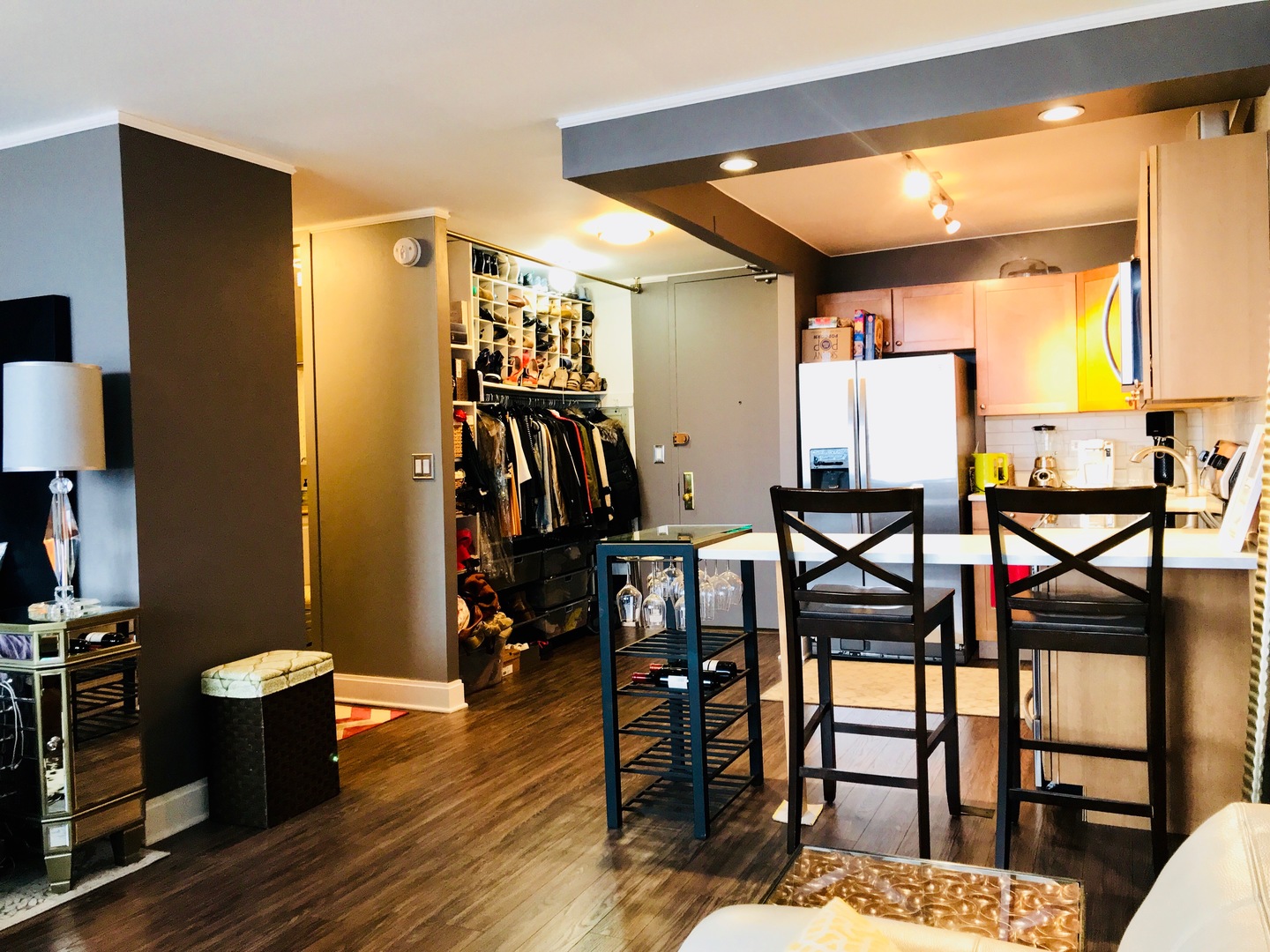 655 West Irving Park Road, Unit 2911 Chicago, IL 60613 - Photo 32 of 42 a livingroom with furniture window and wooden floor