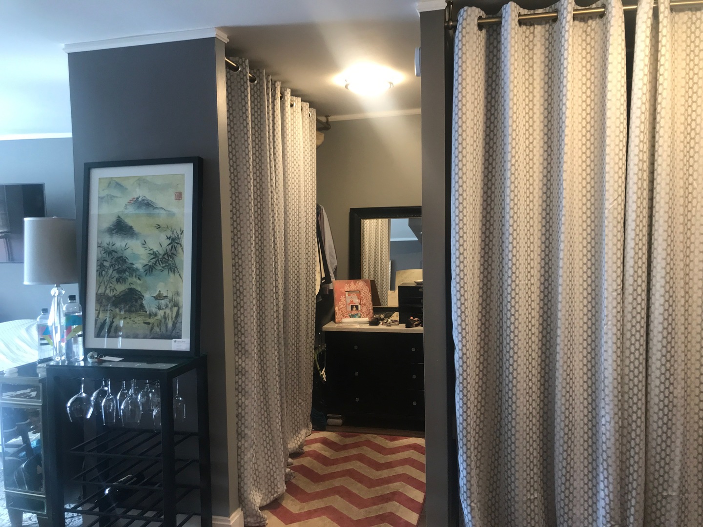 655 West Irving Park Road, Unit 2911 Chicago, IL 60613 - Photo 33 of 42 a bedroom with a bed and a mirror