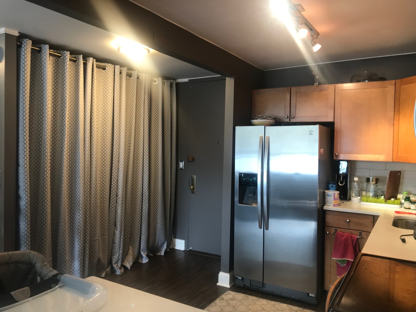 655 West Irving Park Road, Unit 2911 Chicago, IL 60613 - Photo 34 of 42 a metallic refrigerator freezer sitting in a kitchen