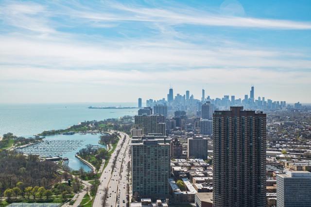 655 West Irving Park Road, Unit 2911 Chicago, IL 60613 - Photo 40 of 42 a view of a city with a city skyline in the background