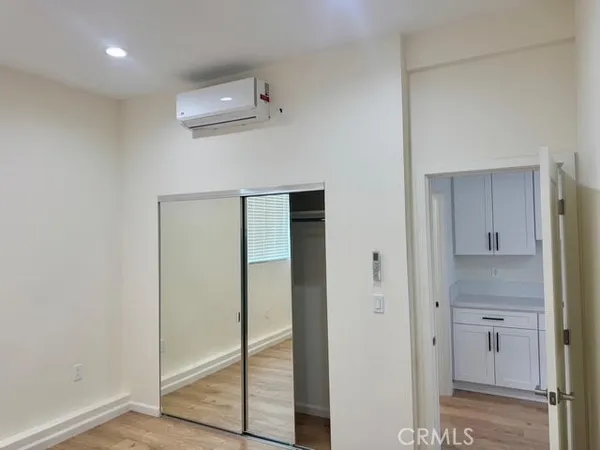 a aerial view of a residential apartment building with a yard