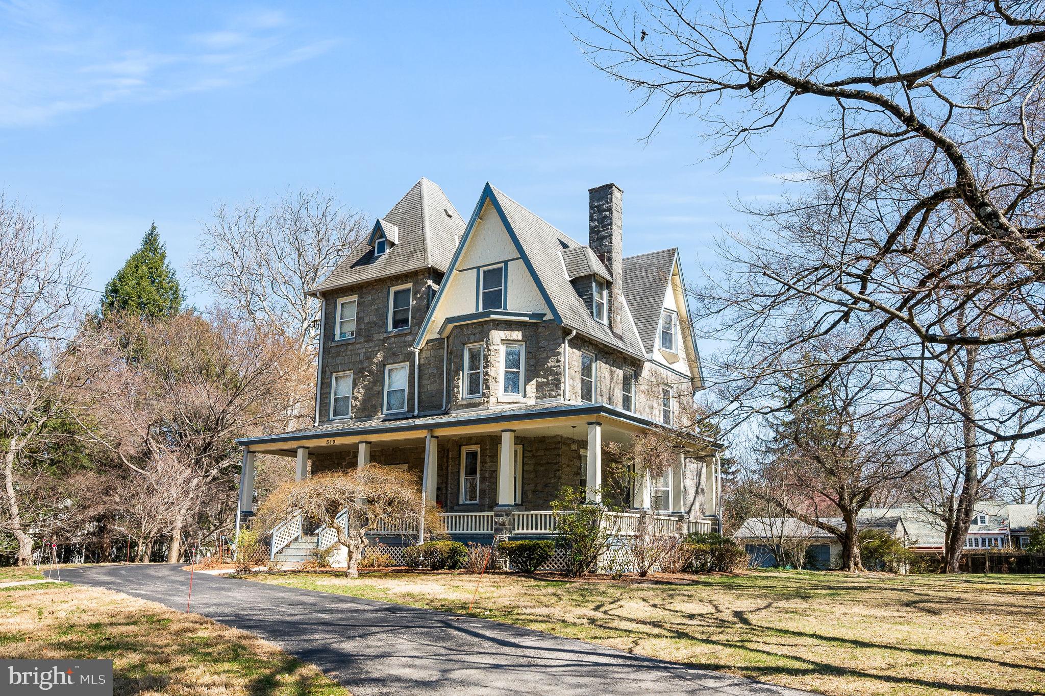 519 Walnut Lane, Unit 1 Swarthmore, PA 19081 - Photo 2 of 31 a front view of a house with a yard