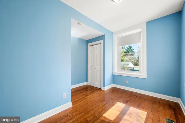 a view of a room that has a window in it