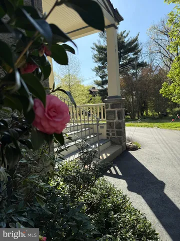 a view of a porch with a bench in patio