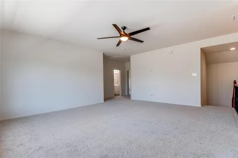 a view of a big room with carpet