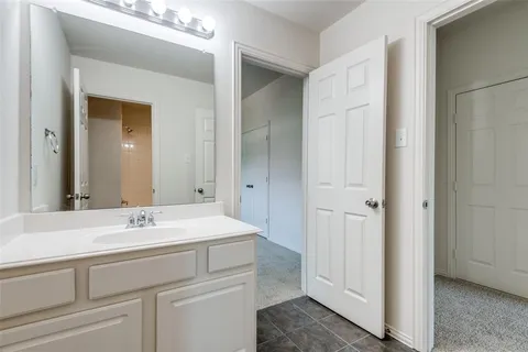 a sink with a mirror