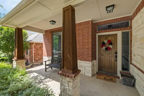 a front view of a house with a porch