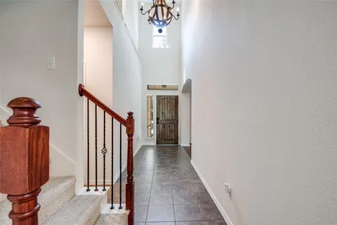 a view of a hallway with closet
