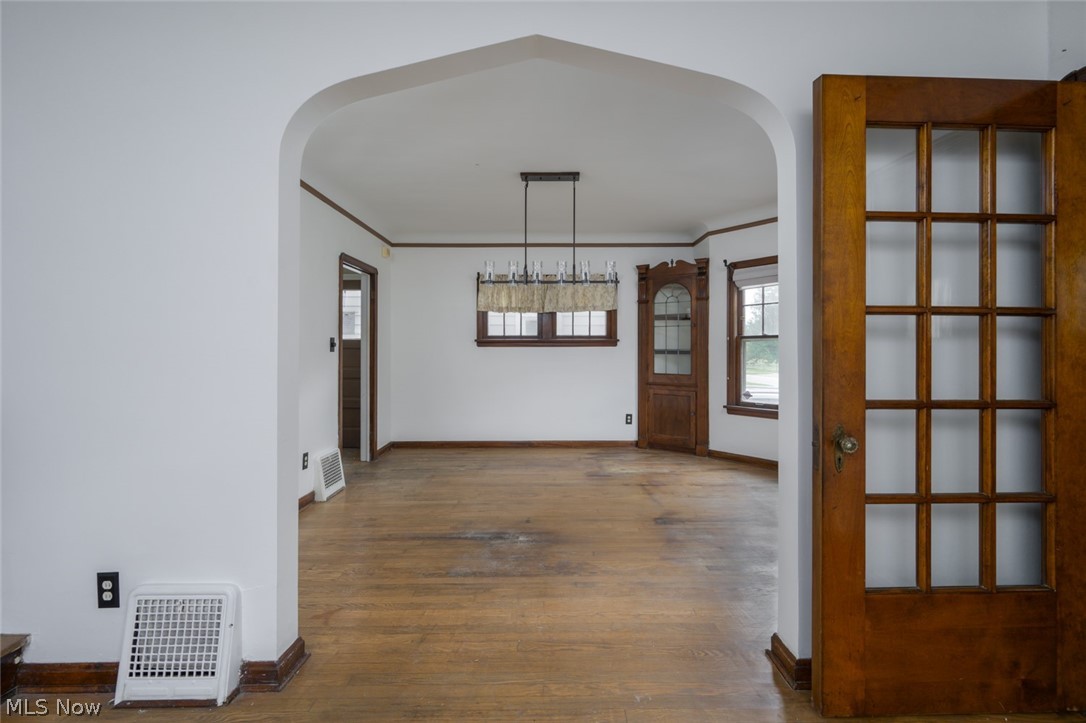 3869 Montevista Road Cleveland, OH 44121 - Photo 8 of 43 Unfurnished dining area with hardwood / wood-style floors