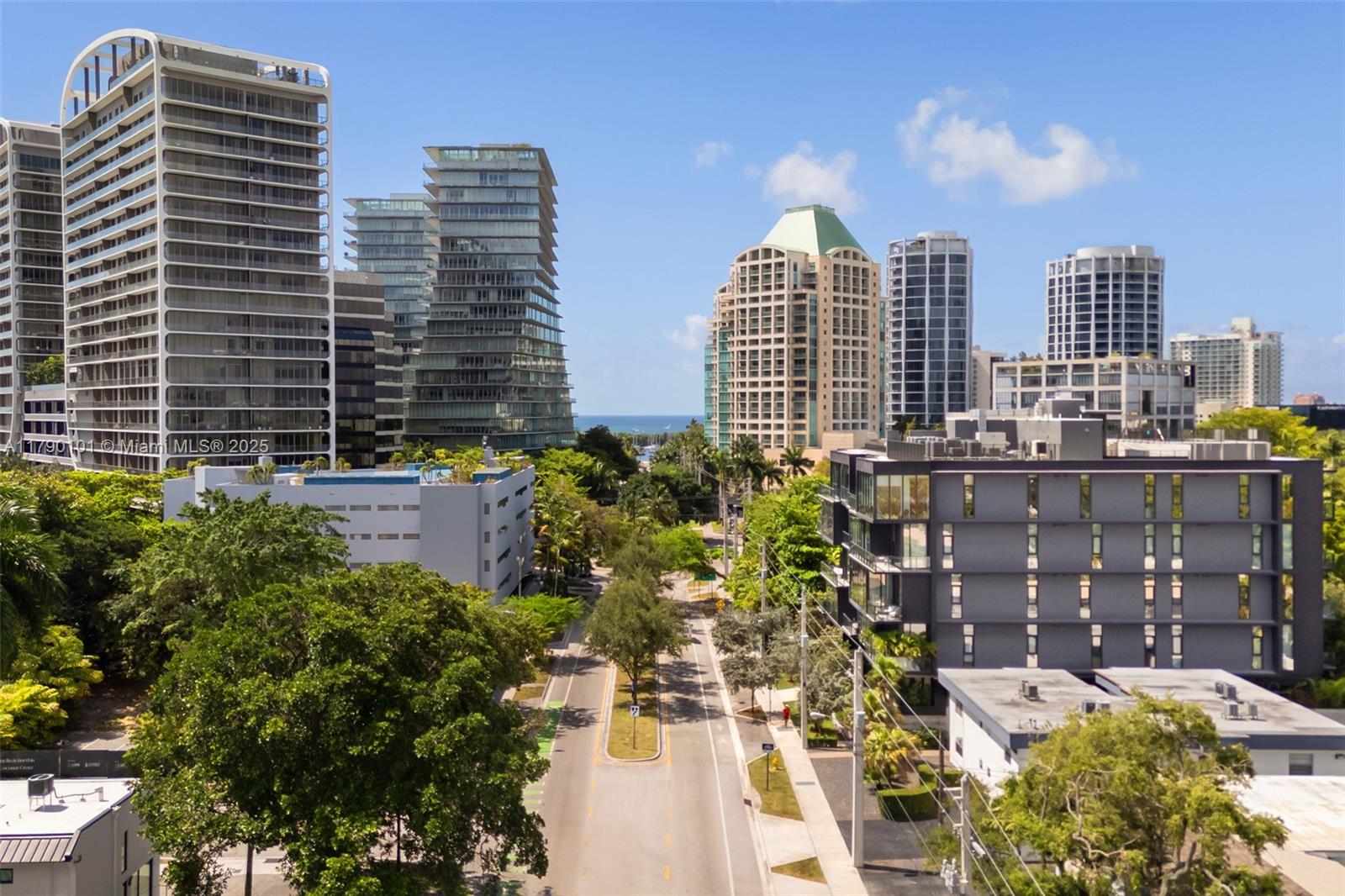 3156 Southwest 27th Avenue, Unit 402 Miami, FL 33133 - Photo 22 of 28 a view of a city with tall buildings