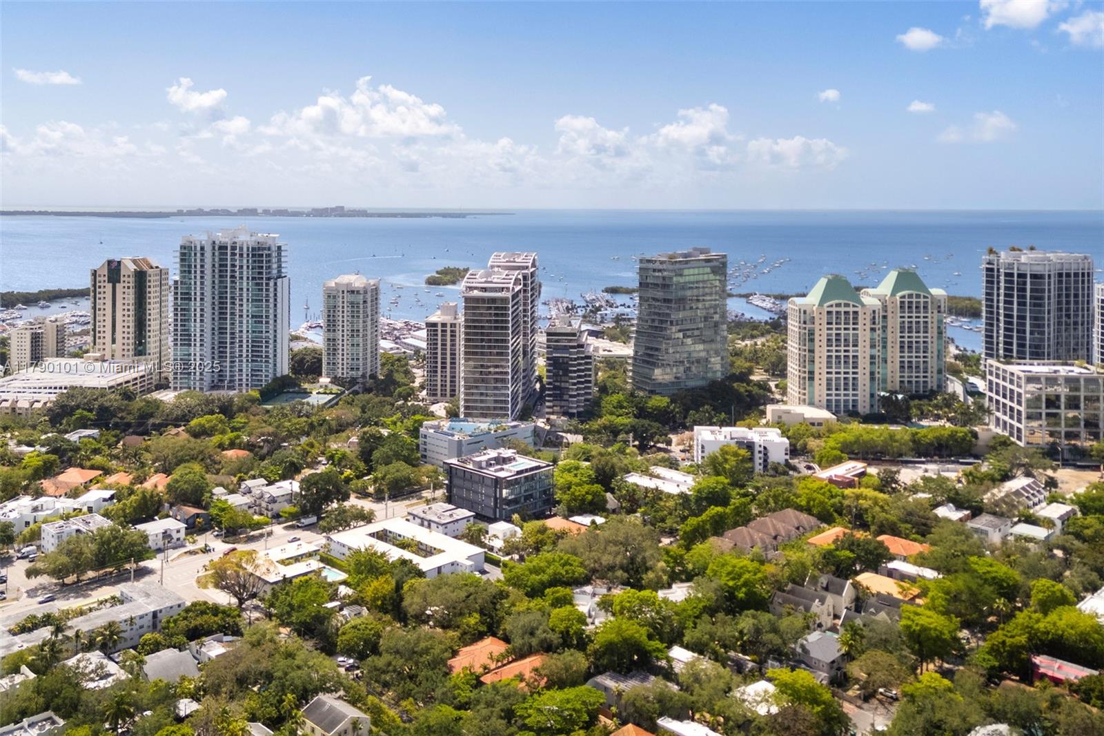 3156 Southwest 27th Avenue, Unit 402 Miami, FL 33133 - Photo 24 of 28 a view of a city with tall buildings
