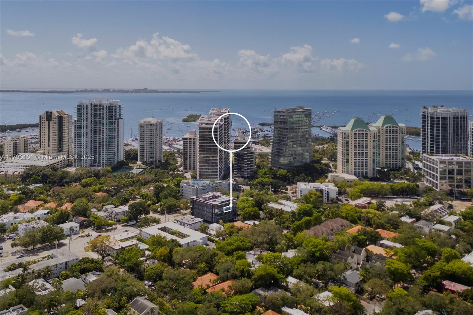 3156 Southwest 27th Avenue, Unit 402 Miami, FL 33133 - Photo 25 of 28 a view of a city with tall buildings