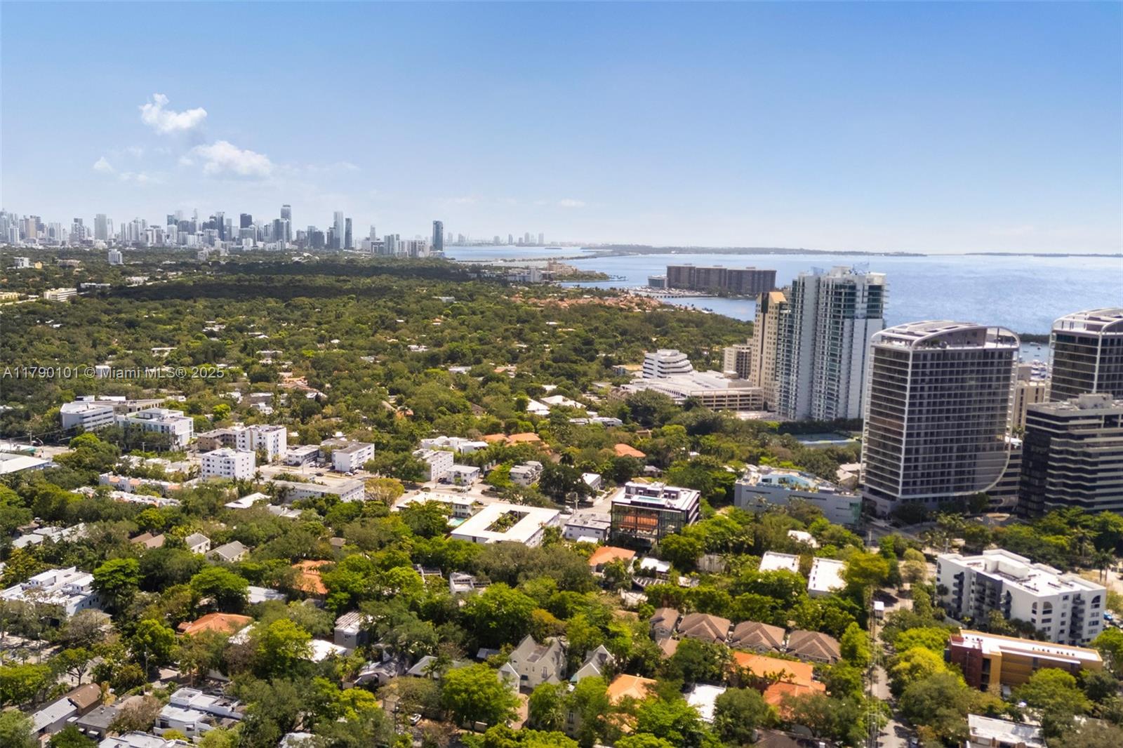 3156 Southwest 27th Avenue, Unit 402 Miami, FL 33133 - Photo 26 of 28 a view of a city with tall buildings