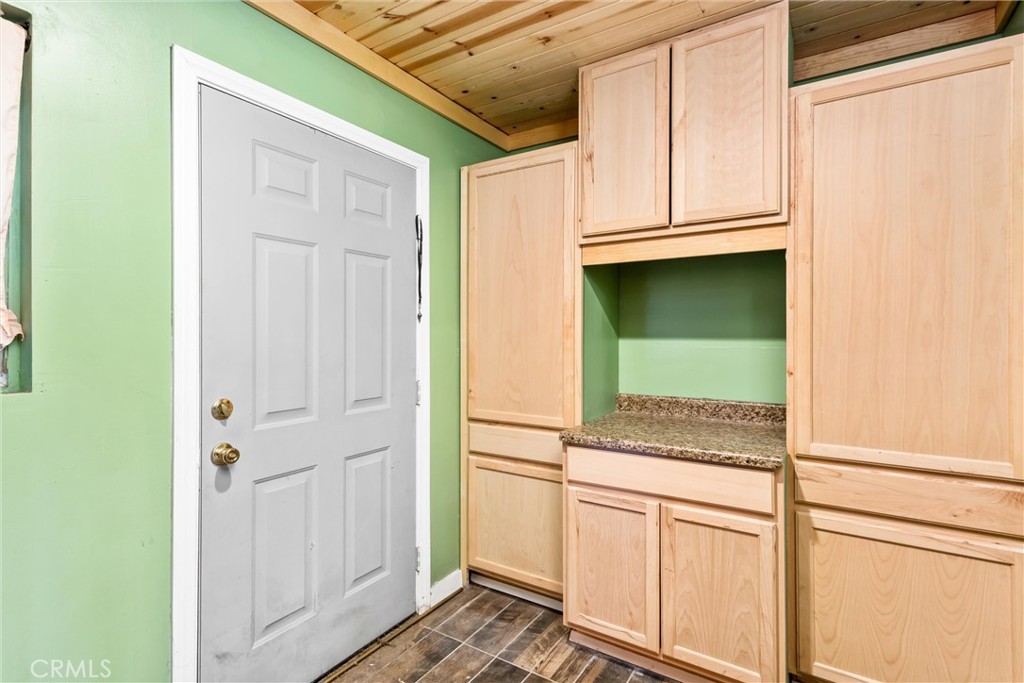 450 West Cromwell Street Rialto, CA 92376 - Photo 18 of 35 Laundry room with lots of storage
