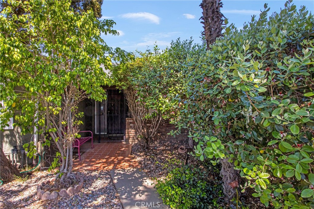 450 West Cromwell Street Rialto, CA 92376 - Photo 5 of 35 Front entrance of the home with security gate. Serene courtyard area for sipping your morning coffee.