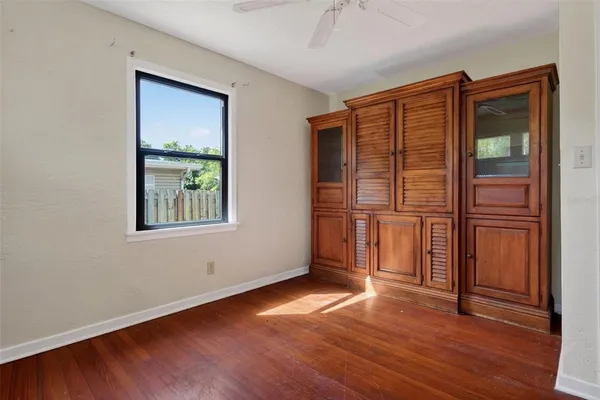 a kitchen with stainless steel appliances granite countertop a refrigerator a stove and a sink