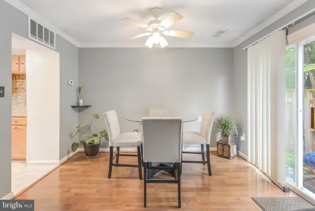 a workspace with furniture and a window