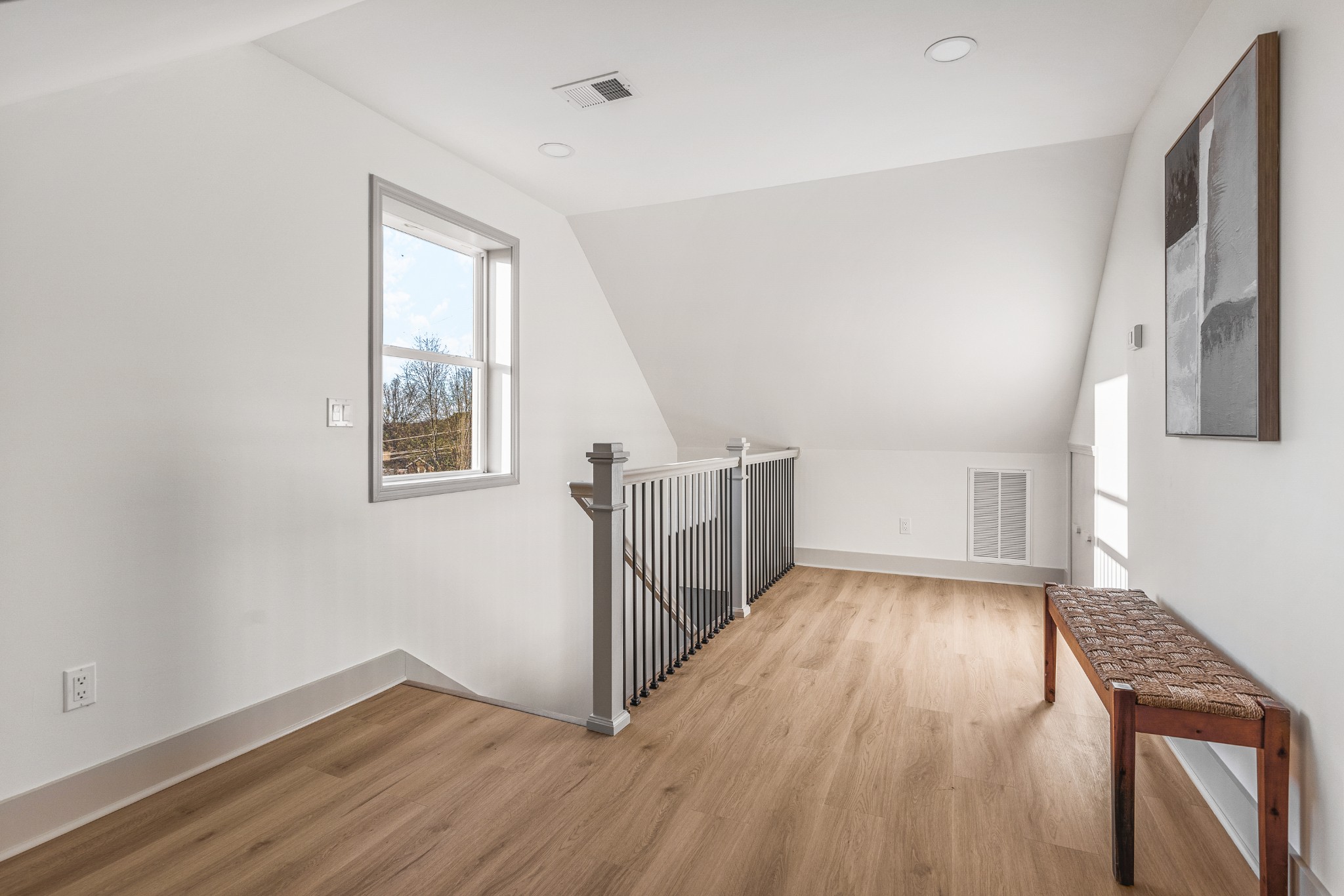 104 Legion Drive Old Hickory, TN 37138 - Photo 18 of 26 an empty room with wooden floor and windows