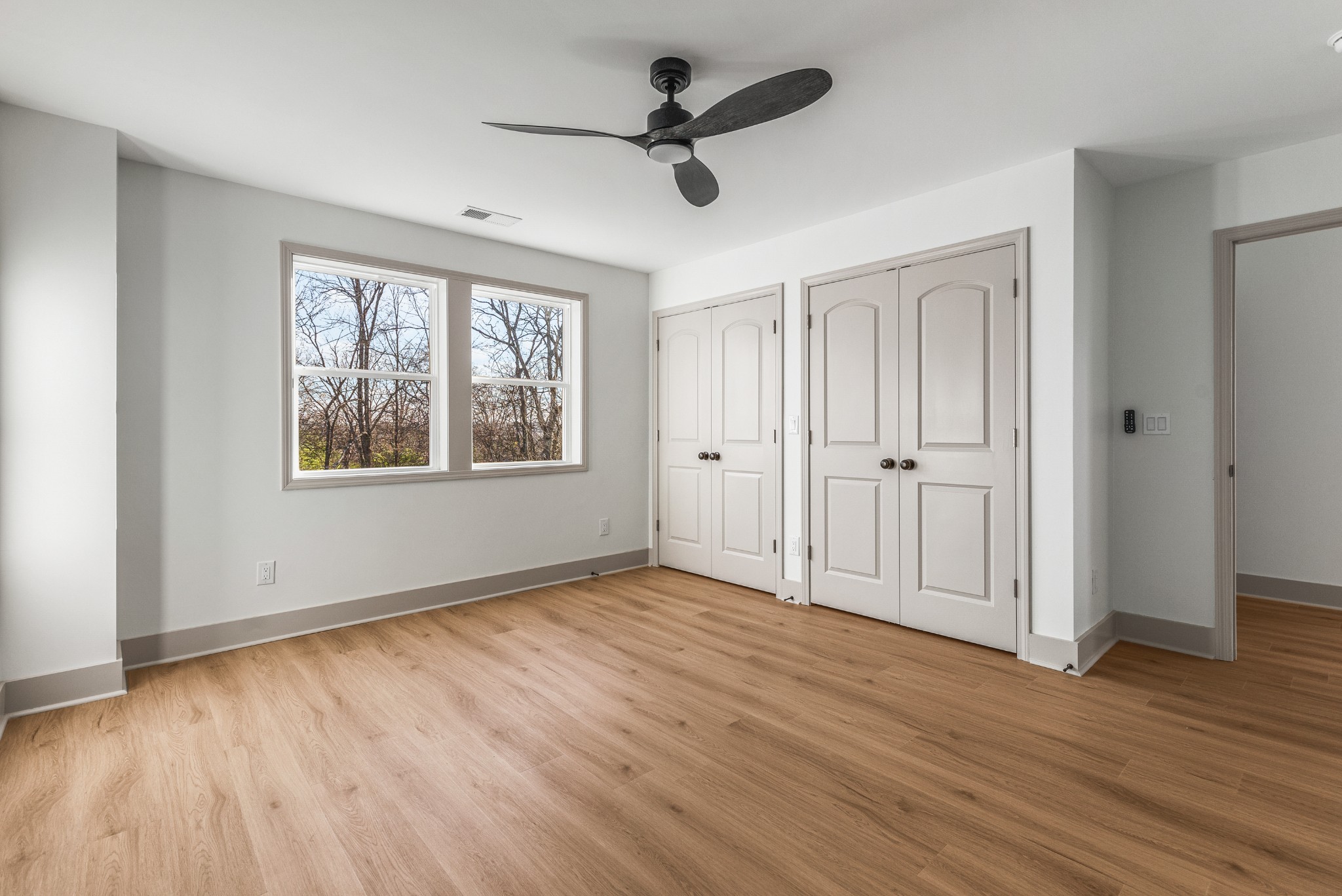 104 Legion Drive Old Hickory, TN 37138 - Photo 21 of 26 wooden floor in an empty room with a window