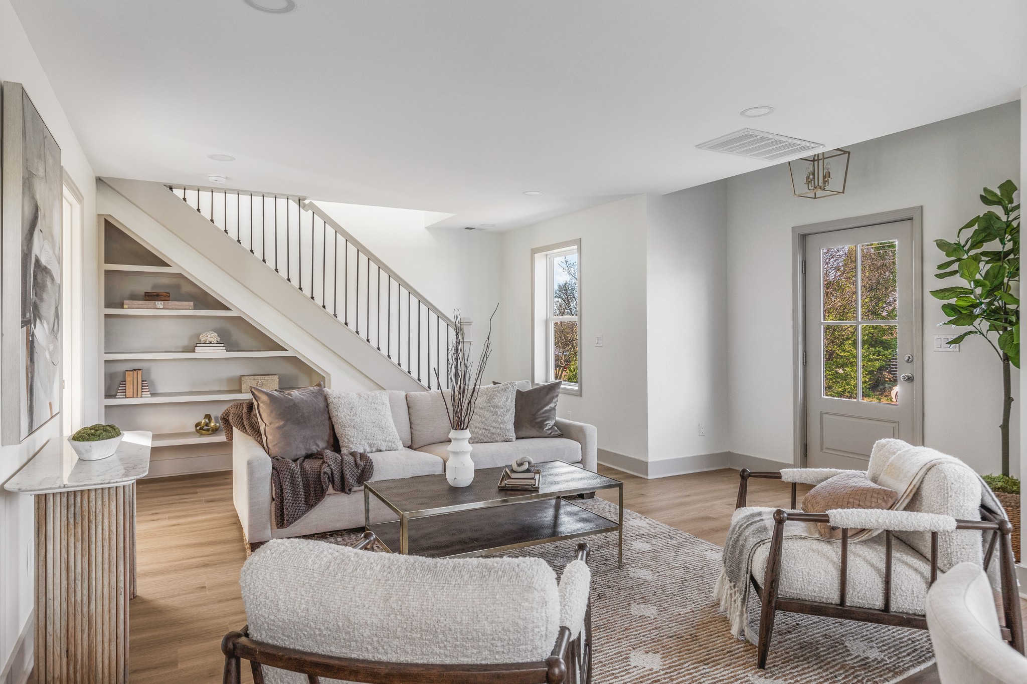 104 Legion Drive Old Hickory, TN 37138 - Photo 6 of 26 a living room with furniture and a dining table with wooden floor