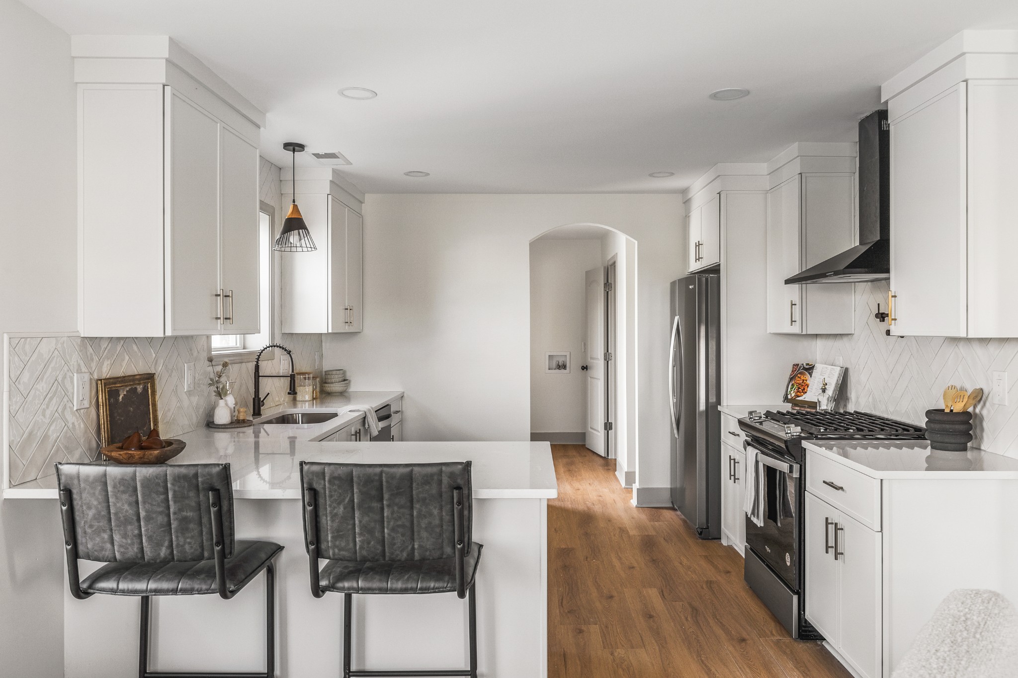 104 Legion Drive Old Hickory, TN 37138 - Photo 10 of 26 a kitchen with a sink cabinets and wooden floor