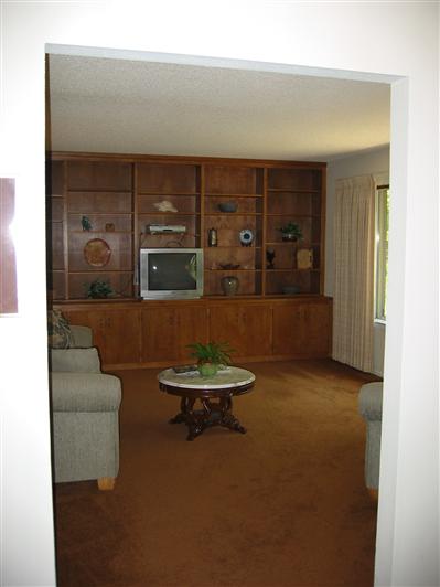 15134 Monreal Road Madera, CA 93636 - Photo 3 of 15 Formal Living room with built in book case