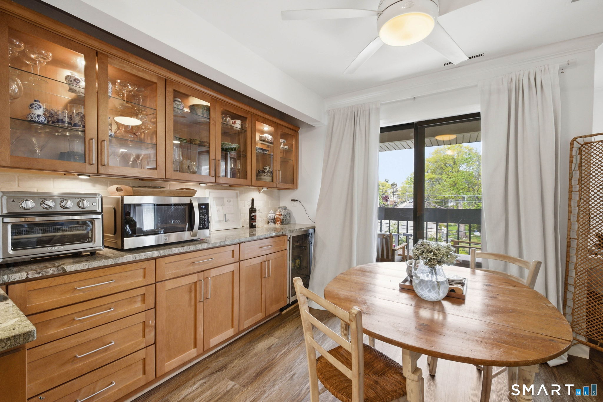 1 Valley Road, Unit 207 Stamford, CT 06902 - Photo 3 of 30 Dining area leading to sliding doors out onto private balcony