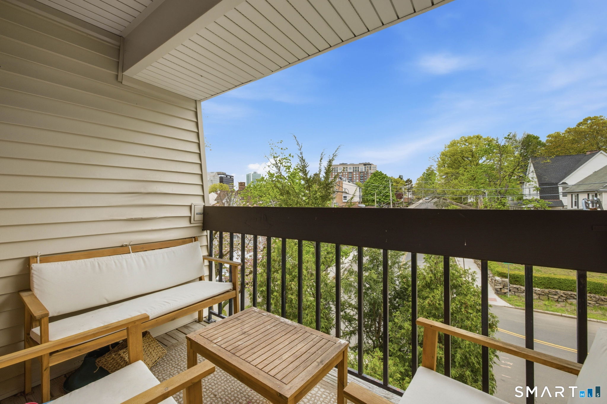 1 Valley Road, Unit 207 Stamford, CT 06902 - Photo 4 of 30 Private balcony through sliding doors off the dining area.