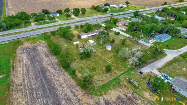 a view of a garden from a balcony