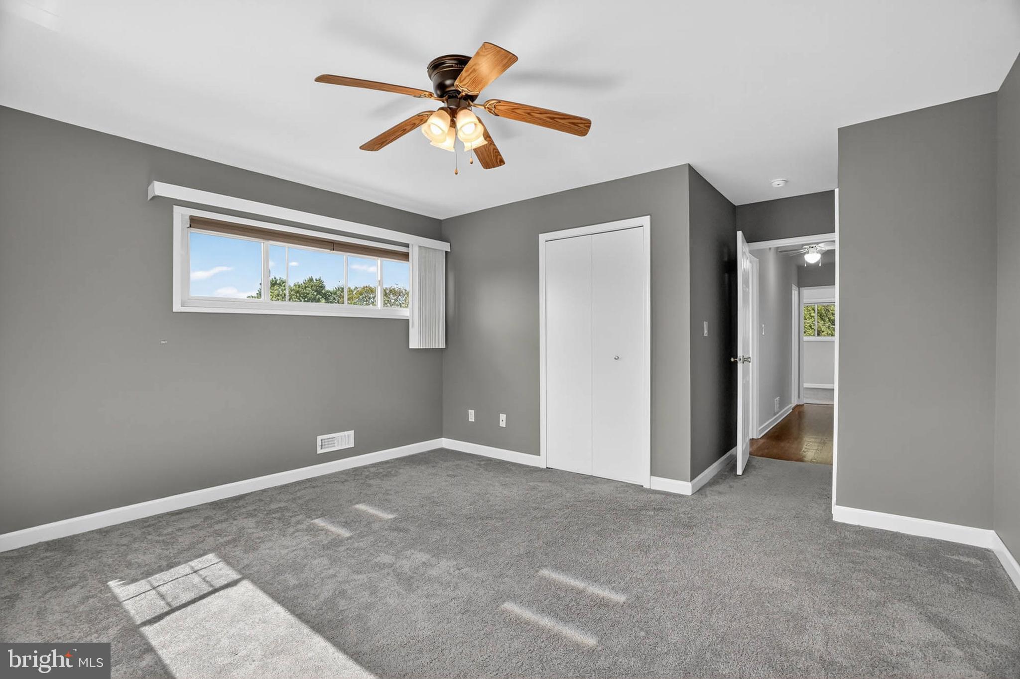 920 Vanderwood Road Catonsville, MD 21228 - Photo 11 of 25 a view of an empty room with a ceiling fan