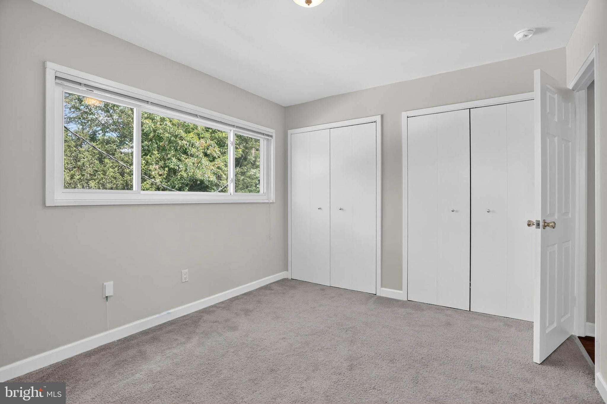 920 Vanderwood Road Catonsville, MD 21228 - Photo 15 of 25 a view of an empty room with a window