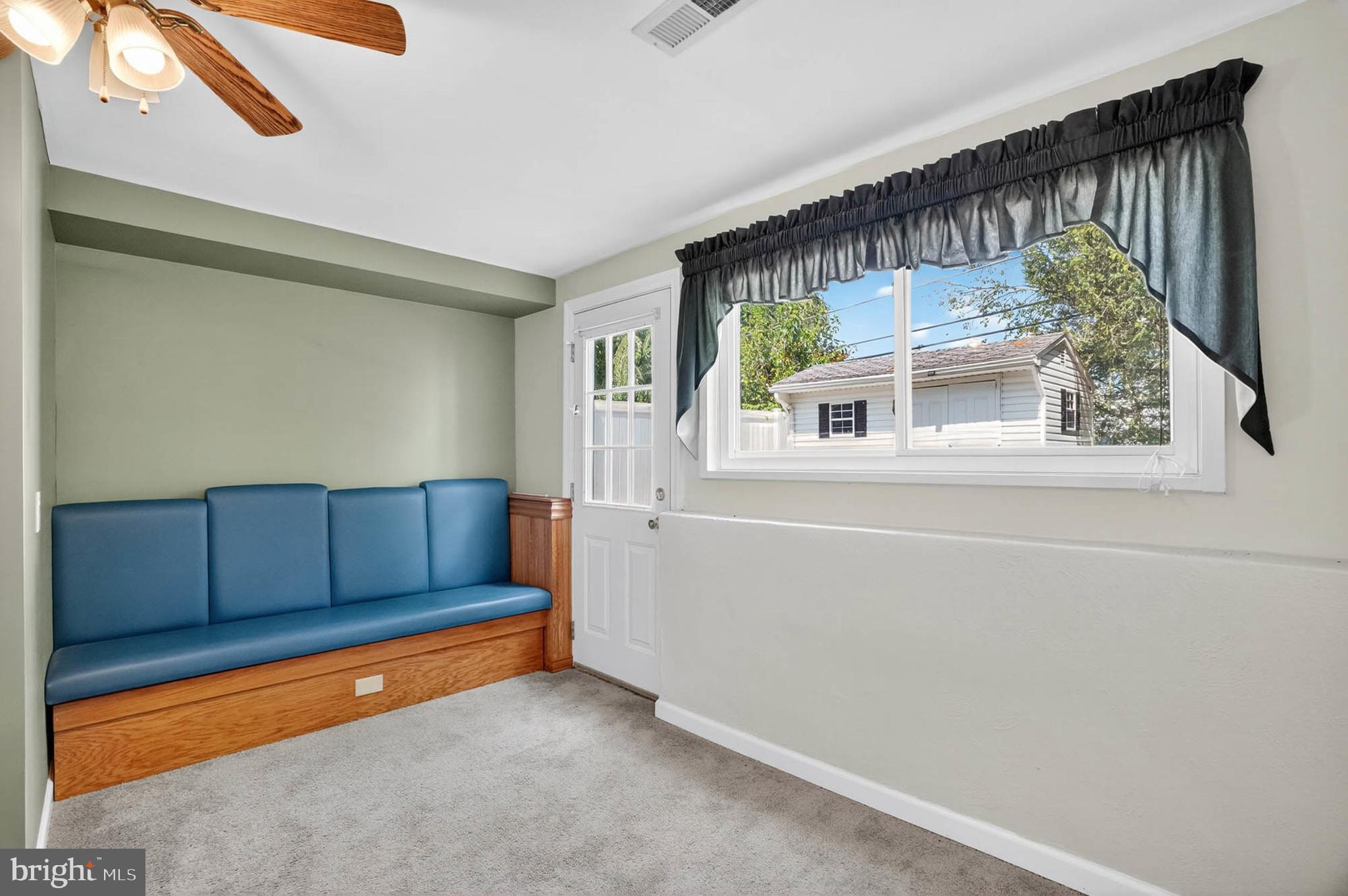 920 Vanderwood Road Catonsville, MD 21228 - Photo 17 of 25 a living room with furniture and a large window