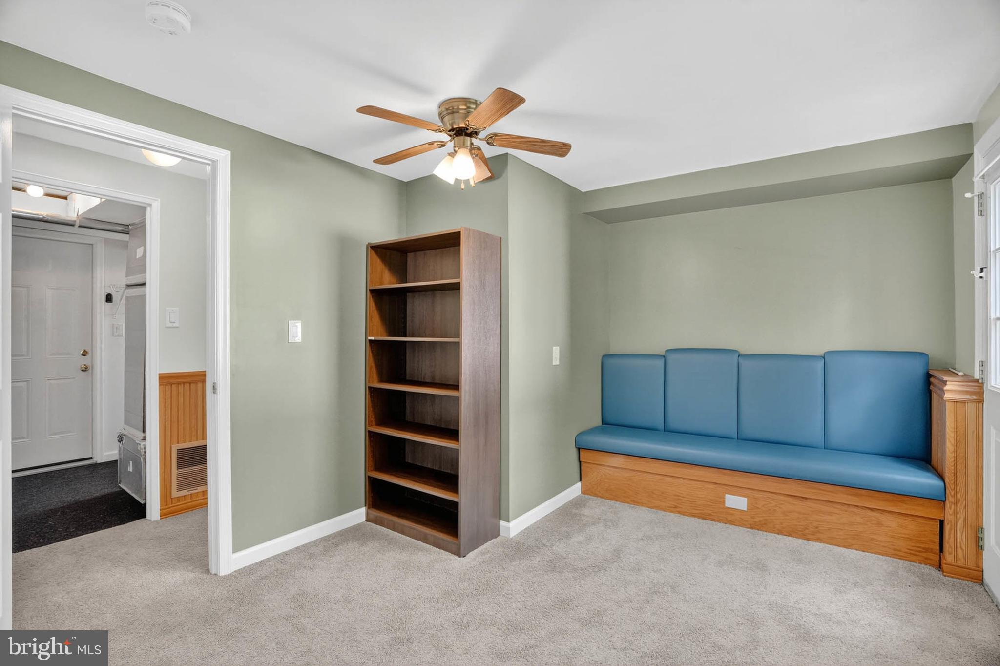 920 Vanderwood Road Catonsville, MD 21228 - Photo 18 of 25 a living room with furniture and a ceiling fan