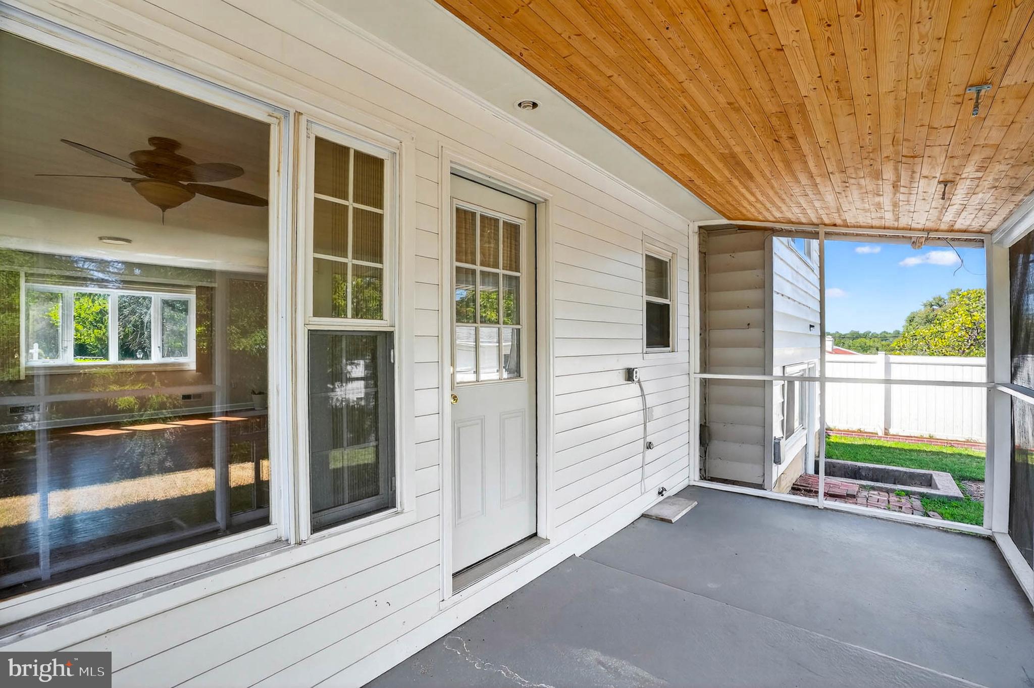 920 Vanderwood Road Catonsville, MD 21228 - Photo 22 of 25 a view of a porch with wooden floor and gate
