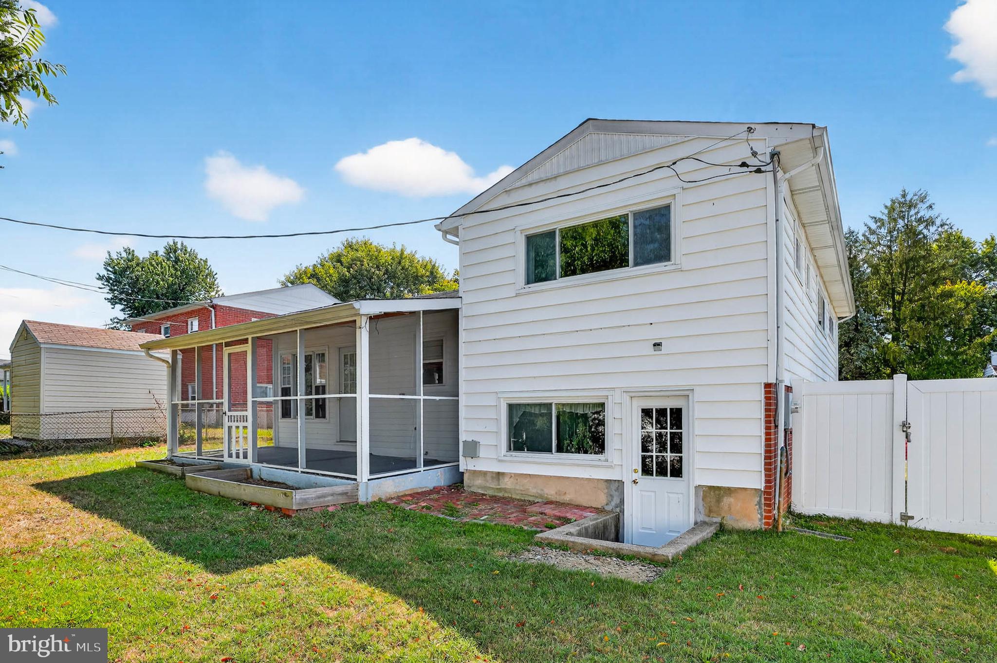 920 Vanderwood Road Catonsville, MD 21228 - Photo 25 of 25 a view of a house with backyard
