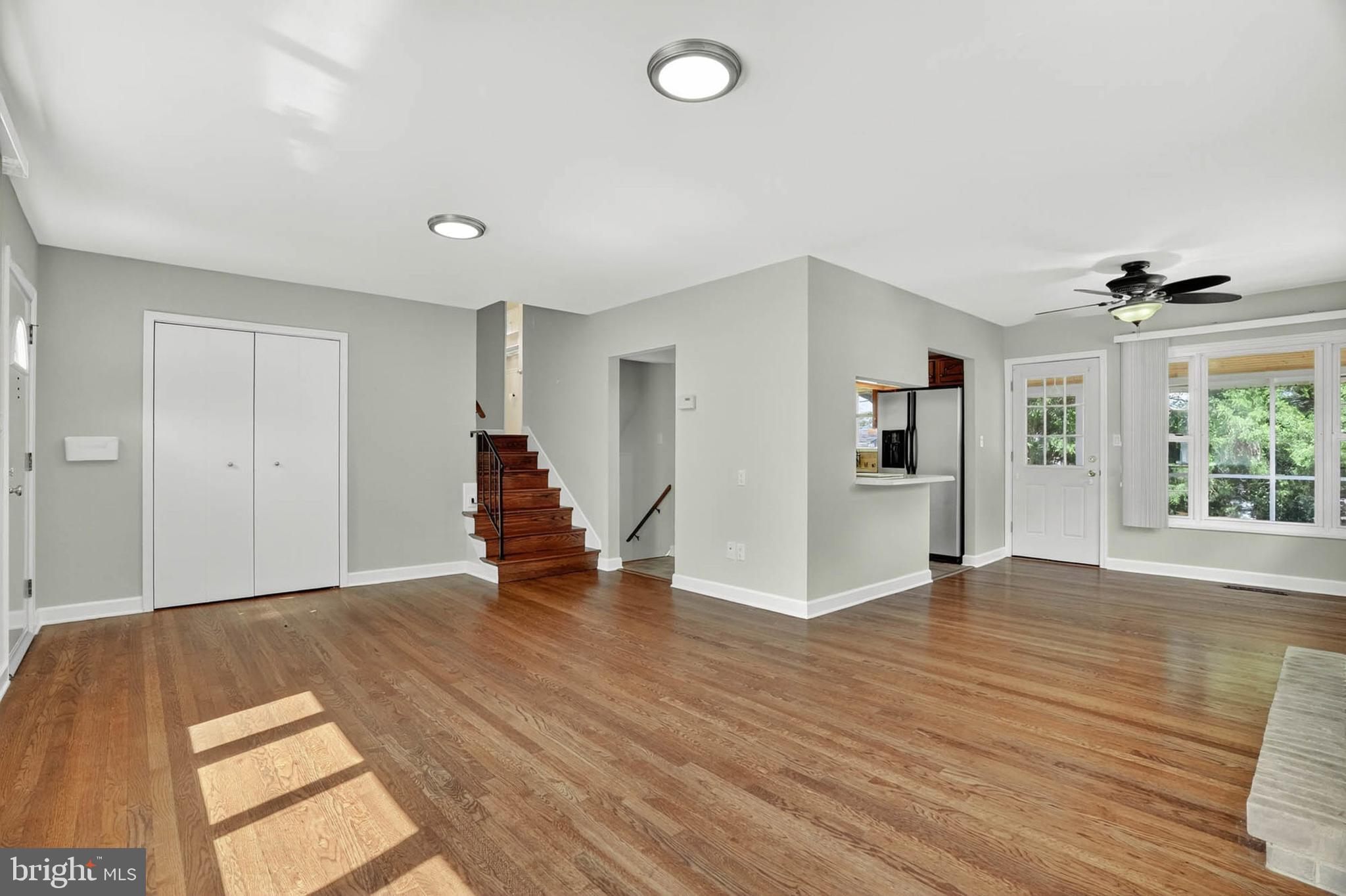 920 Vanderwood Road Catonsville, MD 21228 - Photo 4 of 25 a view of livingroom with hardwood floor and a ceiling fan